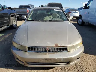 2001 Mitsubishi Galant ES z VIN 4A3AA46G71E214935, wystawiony jako Copart lot #77423604 z przebiegiem Nie podano mil oraz Czysty tytuł • Clean title. Historia ofert i sprzedaży dostępna na DreamBid. Obrazek 5.
