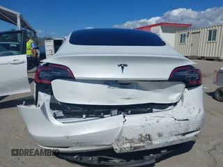 2023 Tesla Model 3 z VIN 5YJ3E1EA3PF451392, wystawiony jako IAAI lot #41668299 z przebiegiem 77 915 mil mil oraz . Historia ofert i sprzedaży dostępna na DreamBid. Obrazek 15.