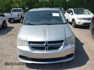 2012 Dodge Grand Caravan SXT with VIN 2C4RDGCG8CR139963, listed as a IAAI auction lot 42243745 with 185,730 mi miles and . Bid and sale history available at DreamBid. Image 6.
