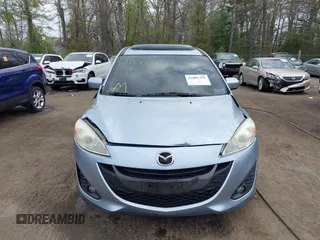 2012 Mazda 5 Grand Touring with VIN JM1CW2DL4C0141511, listed as a IAAI auction lot 42001392 with 99,097 mi miles and . Bid and sale history available at carsss.com. Image 12.
