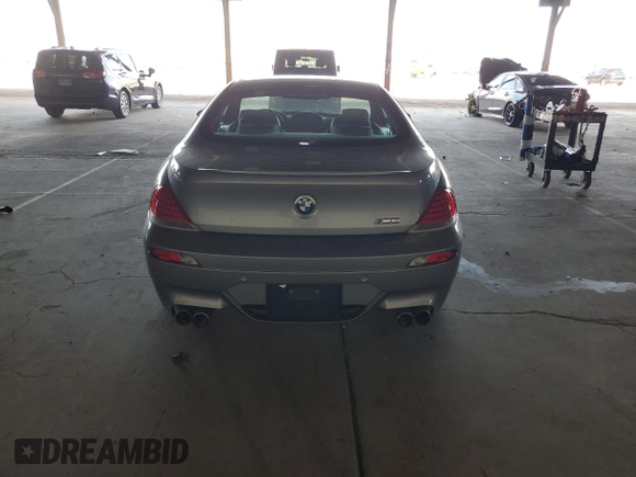 2006 BMW M6 with VIN WBSEH934X6B797428, listed as a Copart auction lot 63462135 with 73,393 mi miles and Salvage title. Bid and sale history available at DreamBid. Image 6.