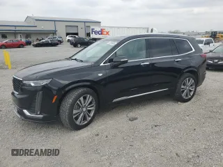 2020 Cadillac XT6 FWD Premium Luxury with VIN 1GYKPCRS2LZ138174, listed as a Copart auction lot 52495655 with 30,822 mi miles and Salvage Title. Bid and sale history available at carsss.com. Image 1.