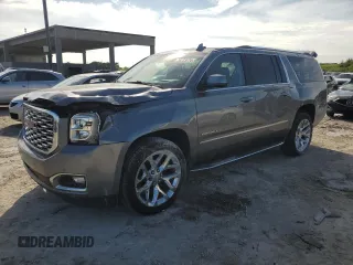 2020 GMC Yukon XL Denali with VIN 1GKS1HKJ8LR293922, listed as a Copart auction lot 76233074 with 67,273 mi miles and Salvage Title. Bid and sale history available at carsss.com. Image 1.