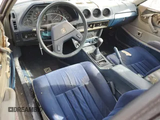 1981 Datsun 280ZX z VIN JN1HZ04S2BX413331, wystawiony jako Copart lot #50431235 z przebiegiem 98 237 mil mil oraz Tytuł czysty. Historia ofert i sprzedaży dostępna na DreamBid. Obrazek 8.