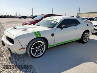 2015 Dodge Challenger SXT with VIN 2C3CDZAG4FH718144, listed as a Copart auction lot 53458295 with 128,029 mi miles and Clean Title. Bid and sale history available at carsss.com. Image 1.