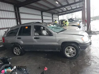 2001 Jeep Grand Cherokee Laredo with VIN 1J4GX48S51C708990, listed as a IAAI auction lot 41656323 with 198,124 mi miles and . Bid and sale history available at DreamBid. Image 12.