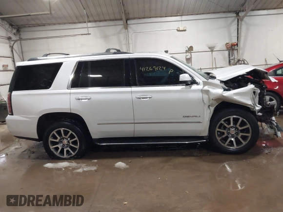 2016 GMC Yukon Denali with VIN 1GKS2CKJXGR271605, listed as a IAAI auction lot 41269124 with 172,432 mi miles. Bid and sale history available at carsss.com. Image 13.