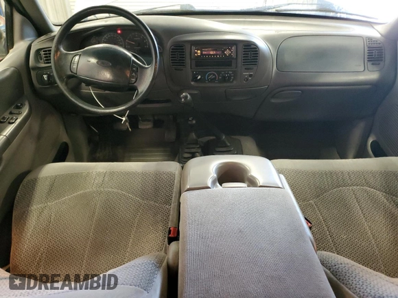 1999 Ford F-150 with VIN 1FTRX18W2XKB01444, listed as a Copart auction lot 52717195 with 210,581 mi miles and Clean title. Bid and sale history available at DreamBid. Image 8.