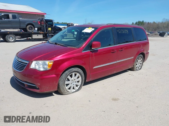 2014 Chrysler Town & Country Touring with VIN 2C4RC1BG8ER437451, listed as a IAAI auction lot 42172398 with 148,297 mi miles and . Bid and sale history available at DreamBid. Image 2.