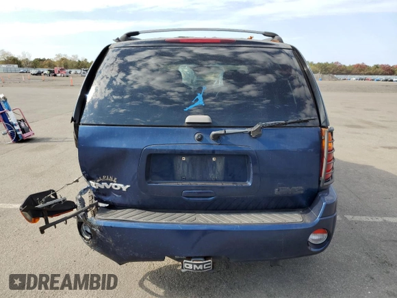 2002 GMC Envoy SLT with VIN 1GKDT13SX22250823, listed as a Copart auction lot 77763094 with 71,005 mi miles and Non Repairable. Bid and sale history available at carsss.com. Image 6.