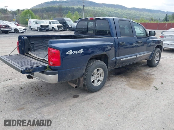 2005 Dodge Dakota Laramie with VIN 1D7HW58NX5S227633, listed as a IAAI auction lot 42122619 with 85,338 mi miles and . Bid and sale history available at DreamBid. Image 4.