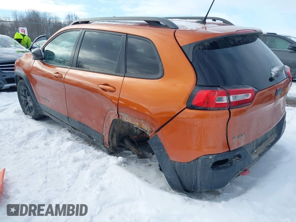 2015 Jeep Cherokee Trailhawk with VIN 1C4PJMBS9FW655233, listed as a IAAI auction lot 41430715 with 138,181 mi miles and . Bid and sale history available at carsss.com. Image 3.