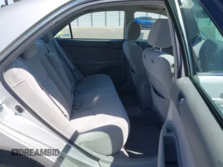 2004 Toyota Camry LE with VIN 4T1BE32K74U300025, listed as a IAAI auction lot 42035954 with 115,203 mi miles. Bid and sale history available at carsss.com. Image 8.