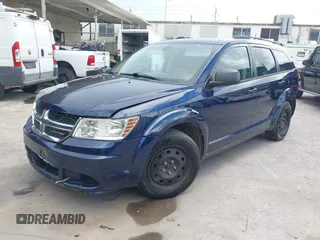 2018 Dodge Journey SE with VIN 3C4PDCAB8JT527048, listed as a IAAI auction lot 42202596 with 187,606 mi miles. Bid and sale history available at carsss.com. Image 2.