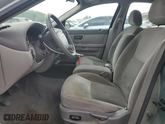2006 Ford Taurus SE с VIN 1FAFP532X6A186042, выставлен на аукционе Copart как лот 54409375 с пробегом 145 687 миль миль и Списание • Salvage title. История ставок и продаж доступна на DreamBid. Изображение 7.