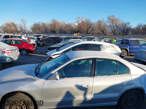 2003 Mitsubishi Galant ES z VIN 4A3AA46G23E093220, wystawiony jako IAAI lot #41287155 z przebiegiem 192 105 mil mil oraz . Historia ofert i sprzedaży dostępna na DreamBid. Obrazek 14.