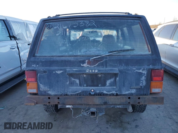 1996 Jeep Cherokee Sport with VIN 1J4FJ68S8TL244251, listed as a Copart auction lot 42321635 with 168,354 mi miles and Salvage Title. Bid and sale history available at carsss.com. Image 6.