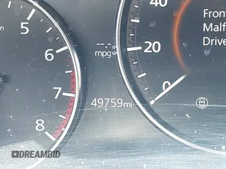 2023 Mazda 3 S Preferred with VIN 3MZBPACM8PM361196, listed as a IAAI auction lot 41940018 with 49,759 mi miles and . Bid and sale history available at DreamBid. Image 16.