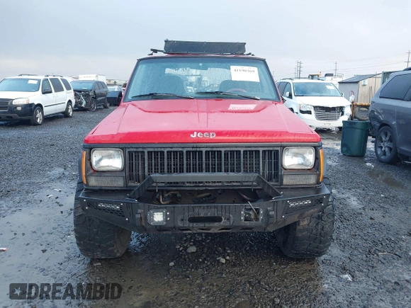 1996 Jeep Cherokee Sport with VIN 1J4FJ68S4TL244893, listed as a IAAI auction lot 41190369 with 192,459 mi miles and . Bid and sale history available at DreamBid. Image 13.