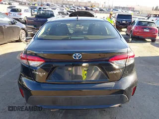 2021 Toyota Corolla Hybrid LE with VIN JTDEAMDE5MJ014959, listed as a IAAI auction lot 41751203 with 26,220 mi miles. Bid and sale history available at carsss.com. Image 16.
