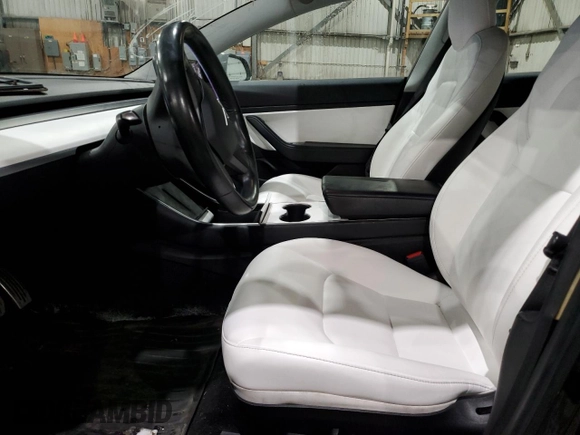 2019 Tesla Model 3 Mid Range with VIN 5YJ3E1EA9KF415439, listed as a Copart auction lot 50301445 with 139,099 mi miles and Salvage Title. Bid and sale history available at DreamBid. Image 7.