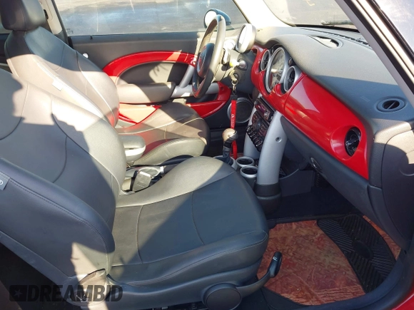 2006 MINI Hardtop S with VIN WMWRE33586TJ34762, listed as a IAAI auction lot 42255599 with 112,664 mi miles and . Bid and sale history available at DreamBid. Image 5.