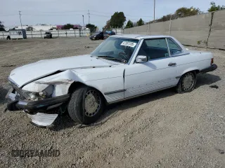 1989 Mercedes-Benz 560 Series 560SL with VIN WDBBA48D9KA103806, listed as a Copart auction lot 53533215 with 933,768 mi miles and Salvage Title. Bid and sale history available at carsss.com. Image 1.