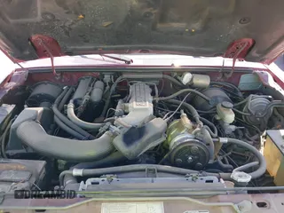 1989 Ford Bronco z VIN 1FMCU14T7KUB48942, wystawiony jako IAAI lot #40053705 z przebiegiem 96 024 mil mil oraz . Historia ofert i sprzedaży dostępna na DreamBid. Obrazek 10.