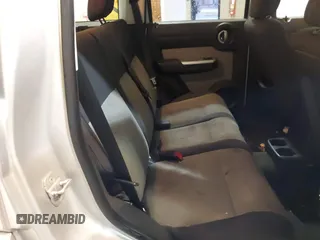 2007 Dodge Nitro SLT z VIN 1D8GU58K97W616455, wystawiony jako IAAI lot #41229813 z przebiegiem 199 421 mil mil oraz . Historia ofert i sprzedaży dostępna na DreamBid. Obrazek 8.
