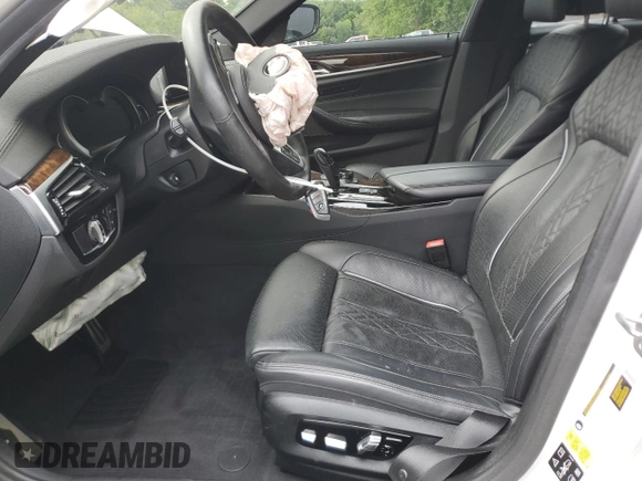 2019 BMW 5 Series M550i xDrive with VIN WBAJB9C54KB288569, listed as a Copart auction lot 58707235 with Not provided miles and Salvage title. Bid and sale history available at DreamBid. Image 7.