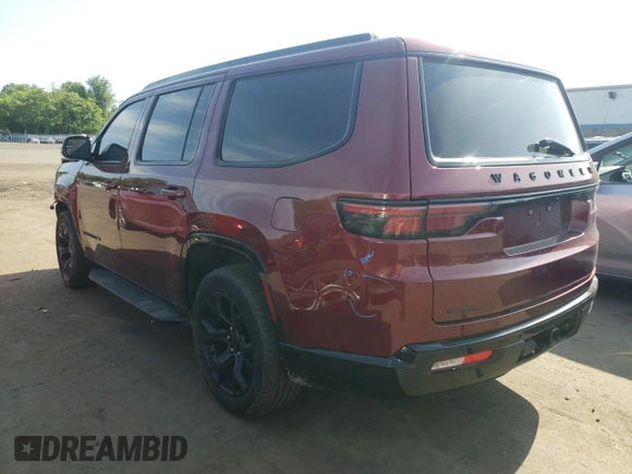 2023 Jeep Wagoneer Series II Carbide with VIN 1C4SJVBP1PS569158, listed as a Copart auction lot 57888145 with 23,613 mi miles and Salvage title. Bid and sale history available at DreamBid. Image 2.