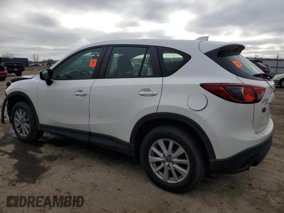 2015 Mazda CX-5 Sport z VIN JM3KE4BY2F0516574, wystawiony jako Copart lot #84100544 z przebiegiem Nie podano mil oraz Szkoda całkowita • Salvage title. Historia ofert i sprzedaży dostępna na DreamBid. Obrazek 2.