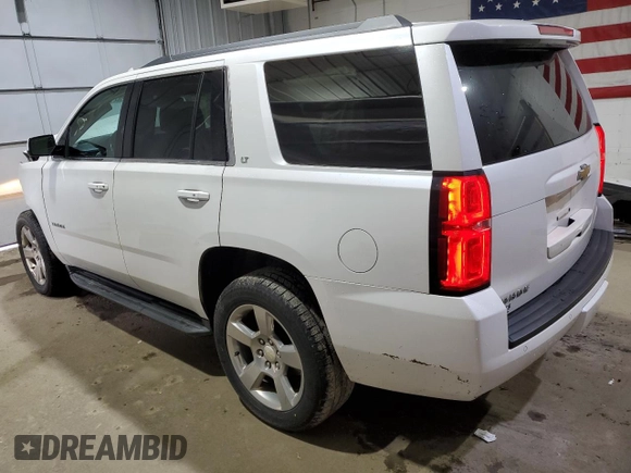 2016 Chevrolet Tahoe LT z VIN 1GNSKBKC1GR297931, wystawiony jako Copart lot #58213565 z przebiegiem 165 140 mil mil oraz Szkoda całkowita • Salvage title. Historia ofert i sprzedaży dostępna na DreamBid. Obrazek 2.