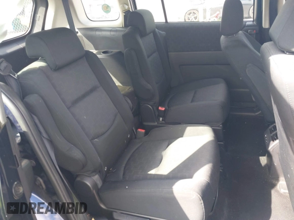 2009 Mazda 5 Sport with VIN JM1CR29L390355978, listed as a IAAI auction lot 41609117 with 118,588 mi miles and . Bid and sale history available at DreamBid. Image 8.