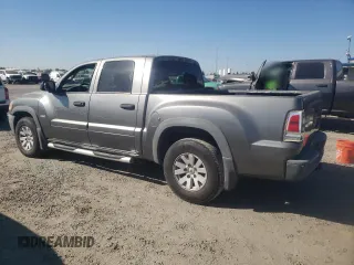 2006 Mitsubishi Raider Duro Cross z VIN 1Z7HC38K06S561639, wystawiony jako Copart lot #73588054 z przebiegiem 166 464 mil mil oraz Szkoda całkowita • Salvage title. Historia ofert i sprzedaży dostępna na DreamBid. Obrazek 2.