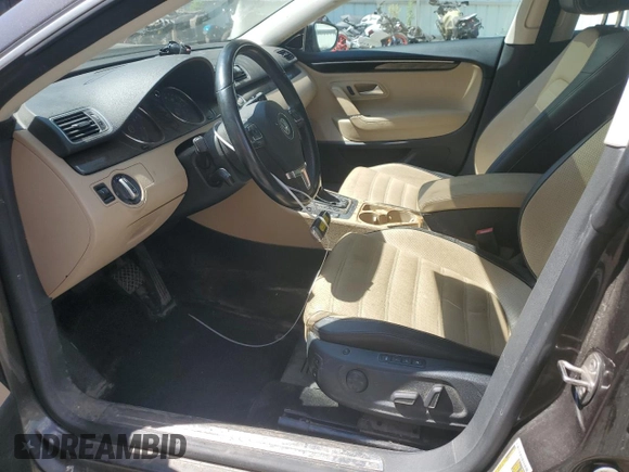 2014 Volkswagen CC VR6 Executive 4Motion with VIN WVWGU7AN3EE539874, listed as a Copart auction lot 61742974 with 124,358 mi miles and Salvage Title. Bid and sale history available at carsss.com. Image 7.