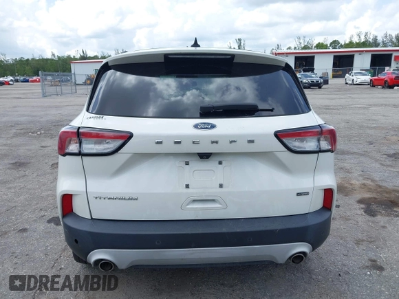 2020 Ford Escape Titanium Hybrid with VIN 1FMCU0DZ3LUC07842, listed as a IAAI auction lot 42456359 with 62,756 mi miles and . Bid and sale history available at DreamBid. Image 17.
