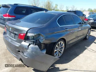 2016 BMW 5 Series 535i xDrive with VIN WBA5B3C55GG252334, listed as a IAAI auction lot 42103036 with 97,749 mi miles and . Bid and sale history available at DreamBid. Image 4.