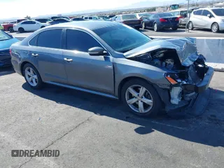 2013 Volkswagen Passat SE w/Sunroof with VIN 1VWBP7A35DC112333, listed as a IAAI auction lot 41718676 with 105,110 mi miles. Bid and sale history available at carsss.com. Image 1.