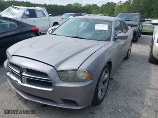 2013 Dodge Charger SE with VIN 2C3CDXBG3DH655523, listed as a IAAI auction lot 42003869 with 172,948 mi miles. Bid and sale history available at carsss.com. Image 2.