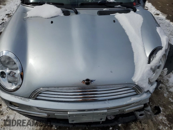 2004 MINI Hardtop with VIN WMWRC334X4TJ62010, listed as a Copart auction lot 45191885 with Not Provided miles and Salvage Title. Bid and sale history available at DreamBid. Image 12.