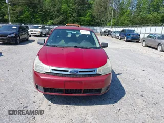 2009 Ford Focus S with VIN 1FAHP34N69W102568, listed as a IAAI auction lot 42137185 with 113,099 mi miles. Bid and sale history available at carsss.com. Image 6.