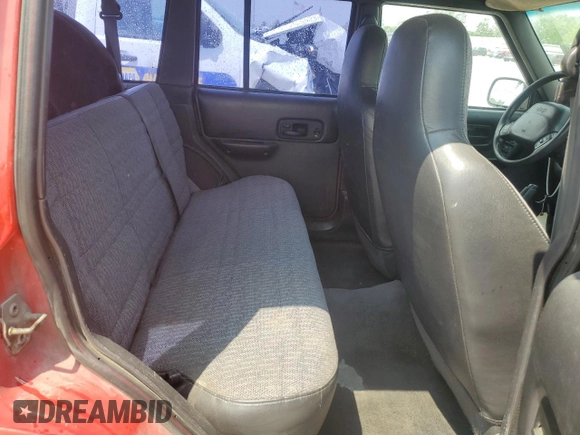 2000 Jeep Cherokee with VIN 1J4FF48S3YL257793, listed as a Copart auction lot 59932535 with 280,237 mi miles and Clean title. Bid and sale history available at DreamBid. Image 11.
