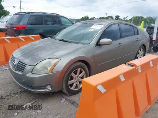 2004 Nissan Maxima SE with VIN 1N4BA41E74C858809, listed as a IAAI auction lot 42436562 with 198,105 mi miles and . Bid and sale history available at DreamBid. Image 2.