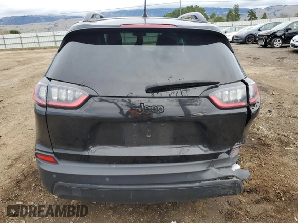 2020 Jeep Cherokee Altitude with VIN 1C4PJLLB2LD593027, listed as a Copart auction lot 86656274 with 76,376 mi miles and Salvage Title. Bid and sale history available at carsss.com. Image 6.