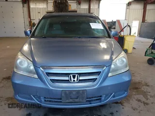 2007 Honda Odyssey EX-L z VIN 5FNRL38617B078923, wystawiony jako IAAI lot #42335122 z przebiegiem 154 352 mil mil oraz . Historia ofert i sprzedaży dostępna na DreamBid. Obrazek 12.