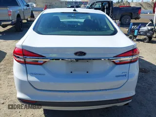2018 Ford Fusion SE z VIN 3FA6P0LU3JR102971, wystawiony jako IAAI lot #41814321 z przebiegiem 135 472 mil mil oraz . Historia ofert i sprzedaży dostępna na DreamBid. Obrazek 16.