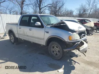 2003 Ford F-150 XLT with VIN 1FTRW08L03KD74119, listed as a Copart auction lot 47373105 with 303,513 mi miles and Salvage Title. Bid and sale history available at carsss.com. Image 4.