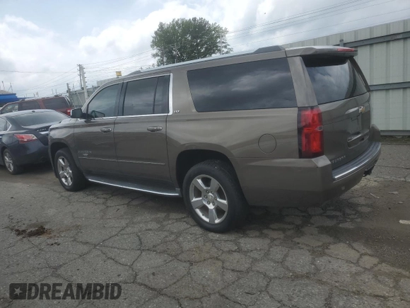 2016 Chevrolet Suburban LTZ with VIN 1GNSKJKC5GR180315, listed as a Copart auction lot 55449375 with 198,760 mi miles and Clean Title. Bid and sale history available at DreamBid. Image 2.