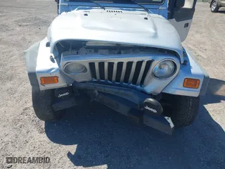 2006 Jeep Wrangler X with VIN 1J4FA39S86P743660, listed as a IAAI auction lot 41890339 with 198,099 mi miles. Bid and sale history available at carsss.com. Image 6.